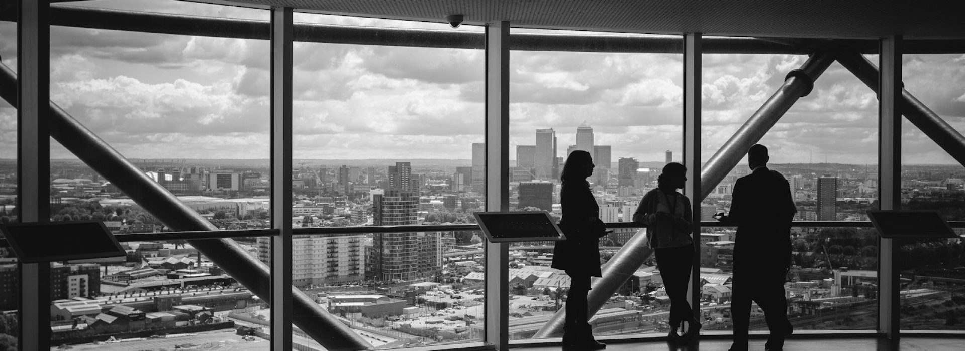 people standing inside city building